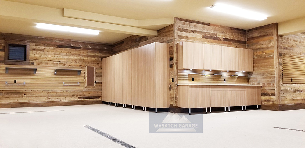 garage-epoxy-wood-cabinetry-wood-wall-lighting