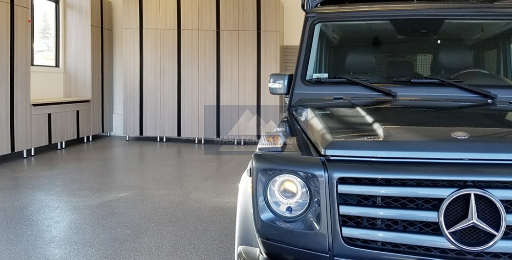 garage-almond-cabinets-epoxy-flooring-car
