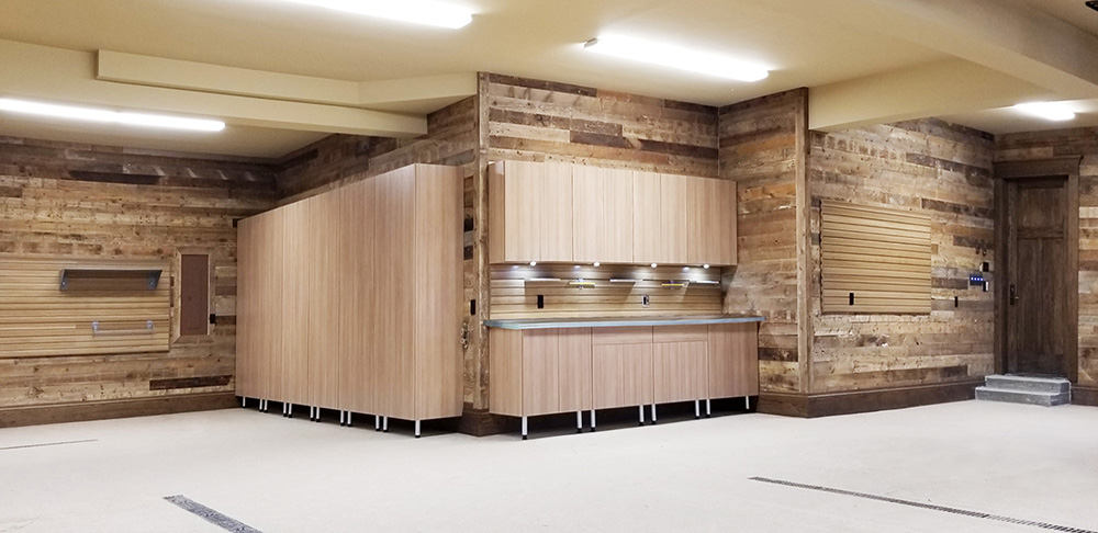 Utah-garage-epoxy-floor-wood-cabinetry-wood-wall-lighting-countertop